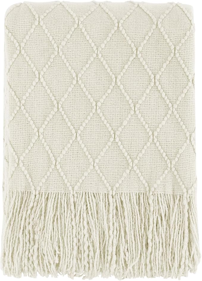 Soft beige sofa throw